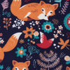 Twinkles thermal set fabric featuring a navy blue background with orange foxes, colorful flowers, and foliage print.