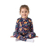 A young girl wearing a Twinkles navy thermal set with a playful fox and floral print, featuring ribbed cuffs.