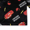 Twinkles black velvet pajama top featuring Lightning McQueen print with yellow lightning bolts for kids