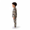 Twinkles Mickey Mouse print long-sleeve pajama set in grey worn by a young boy, side view.
